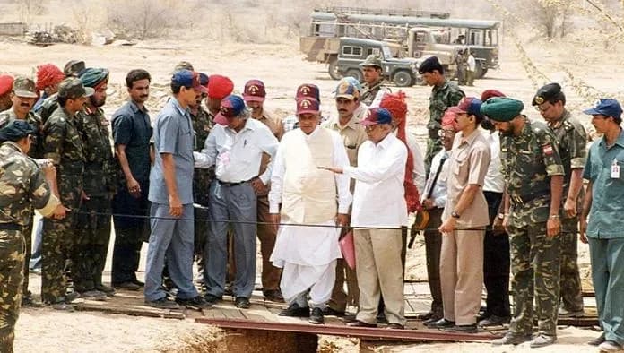 Indian military convoy in Rajasthan desert during Operation Shakti with nuclear scientists in disguise preparing test shafts under the cover of darkness, May 1998.